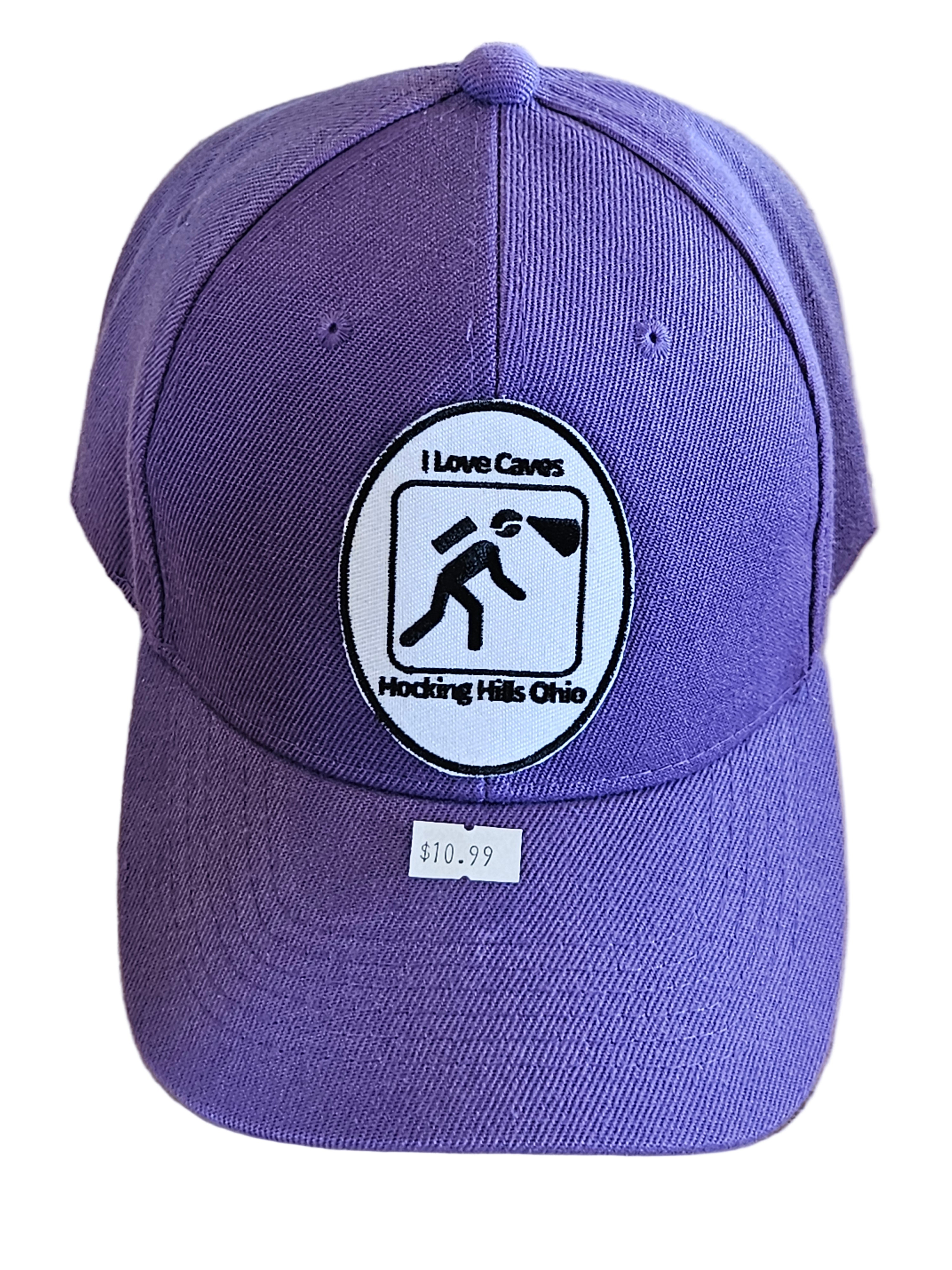 Purple cap with a logo on a wooden surface
