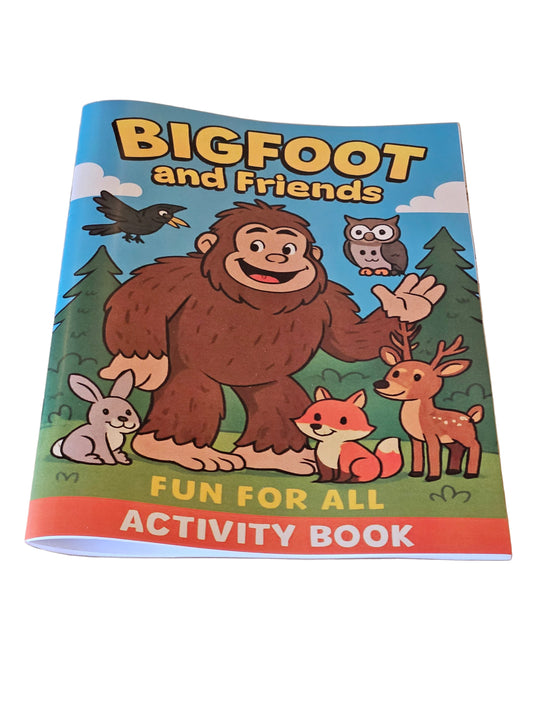 Activity book titled 'Bigfoot and Friends' on a wooden surface