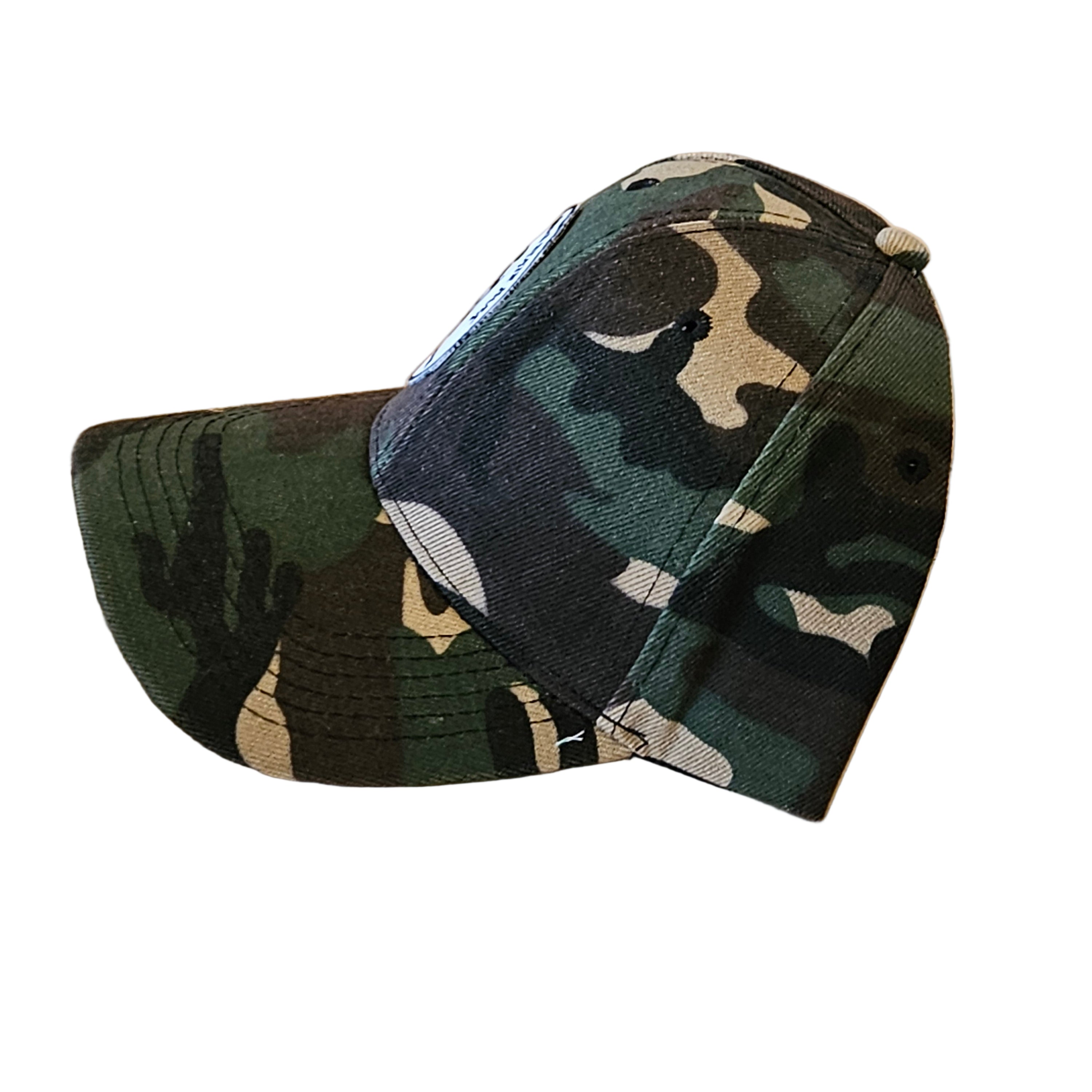 Camouflage-patterned cap on a white surface