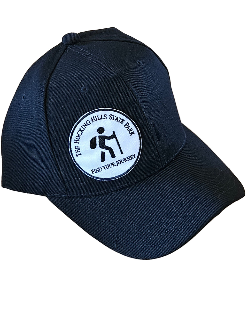 Black cap with a white logo on a wooden surface