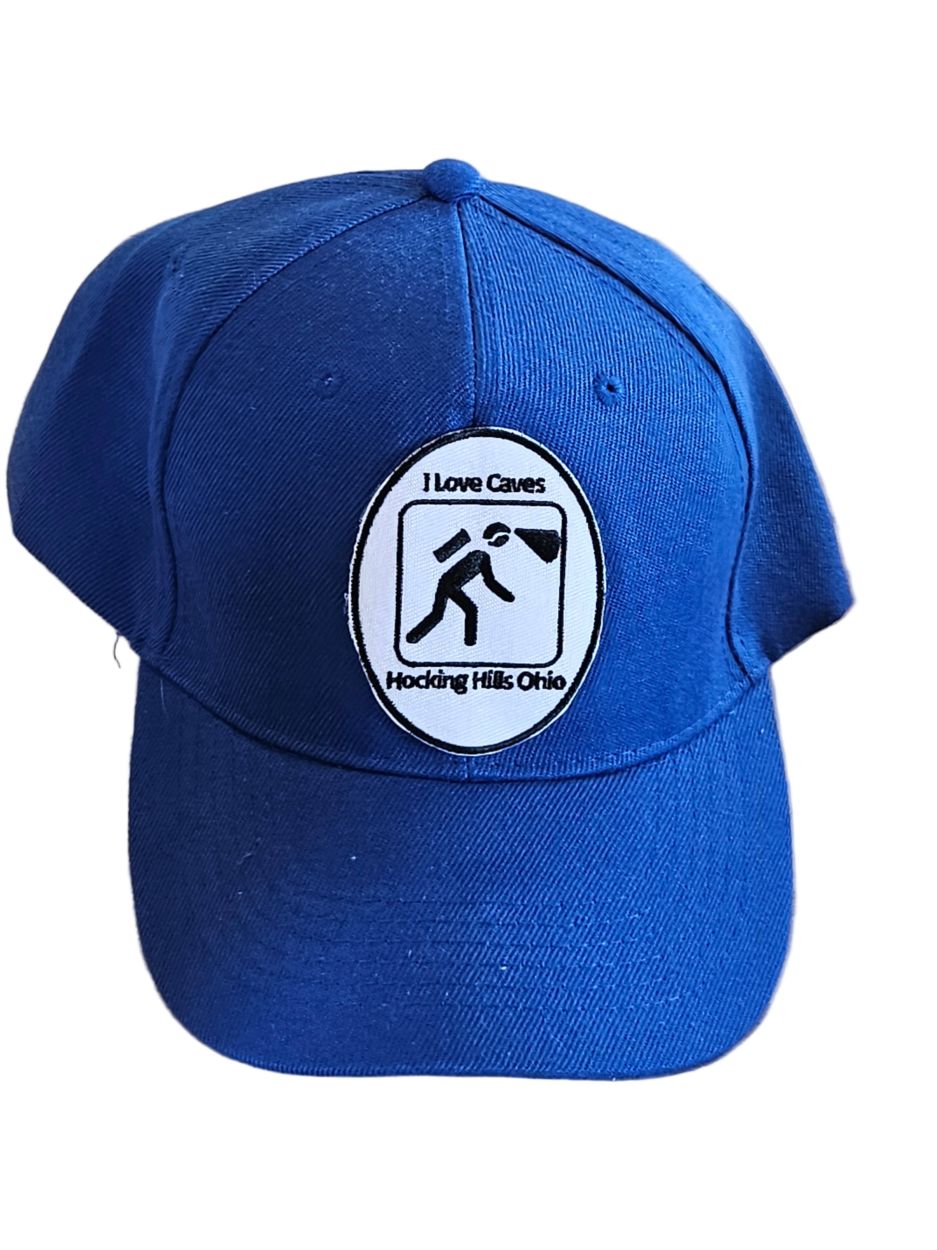 Blue cap with a logo on a wooden surface
