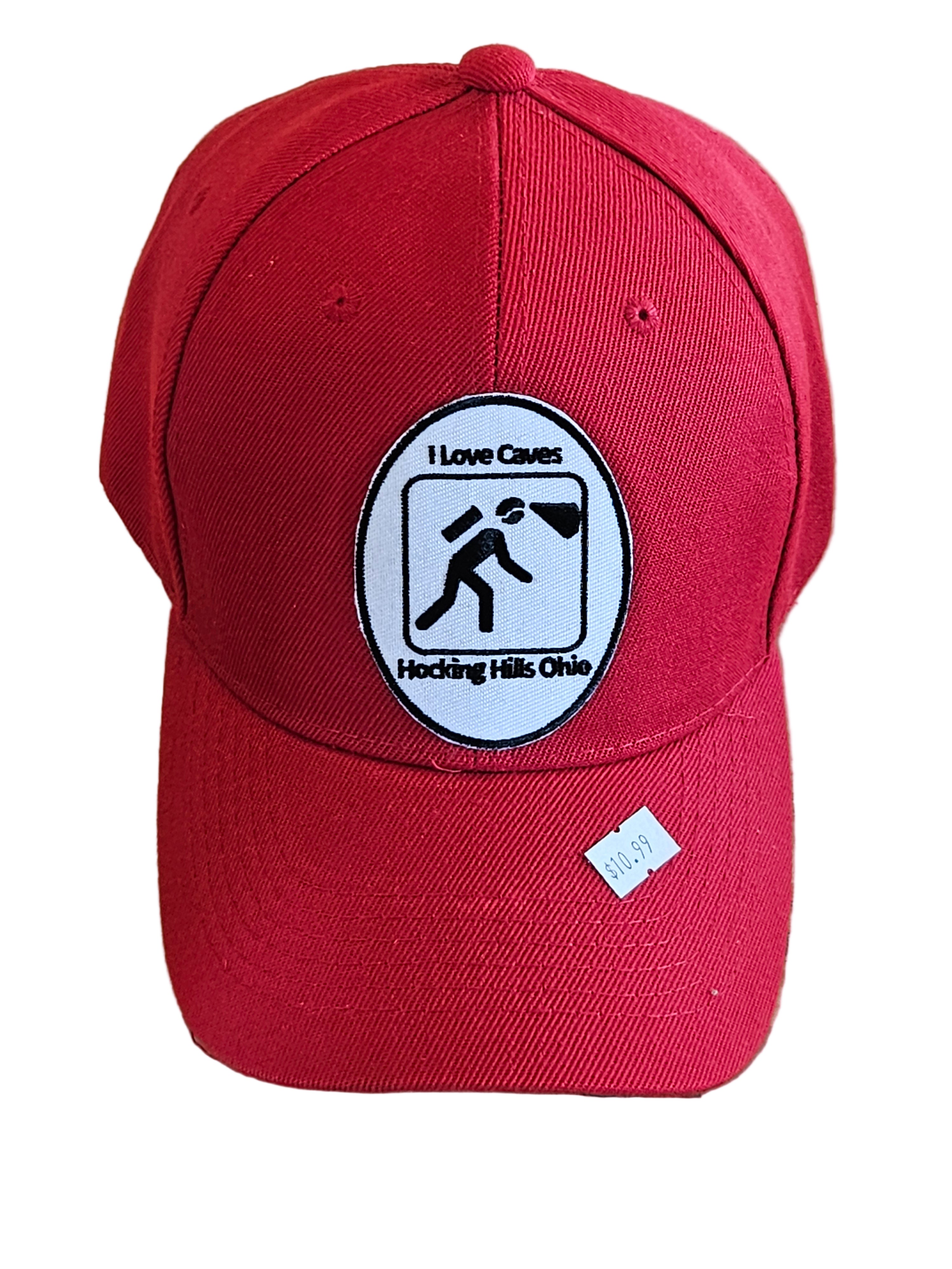 Red cap with a logo on a wooden surface