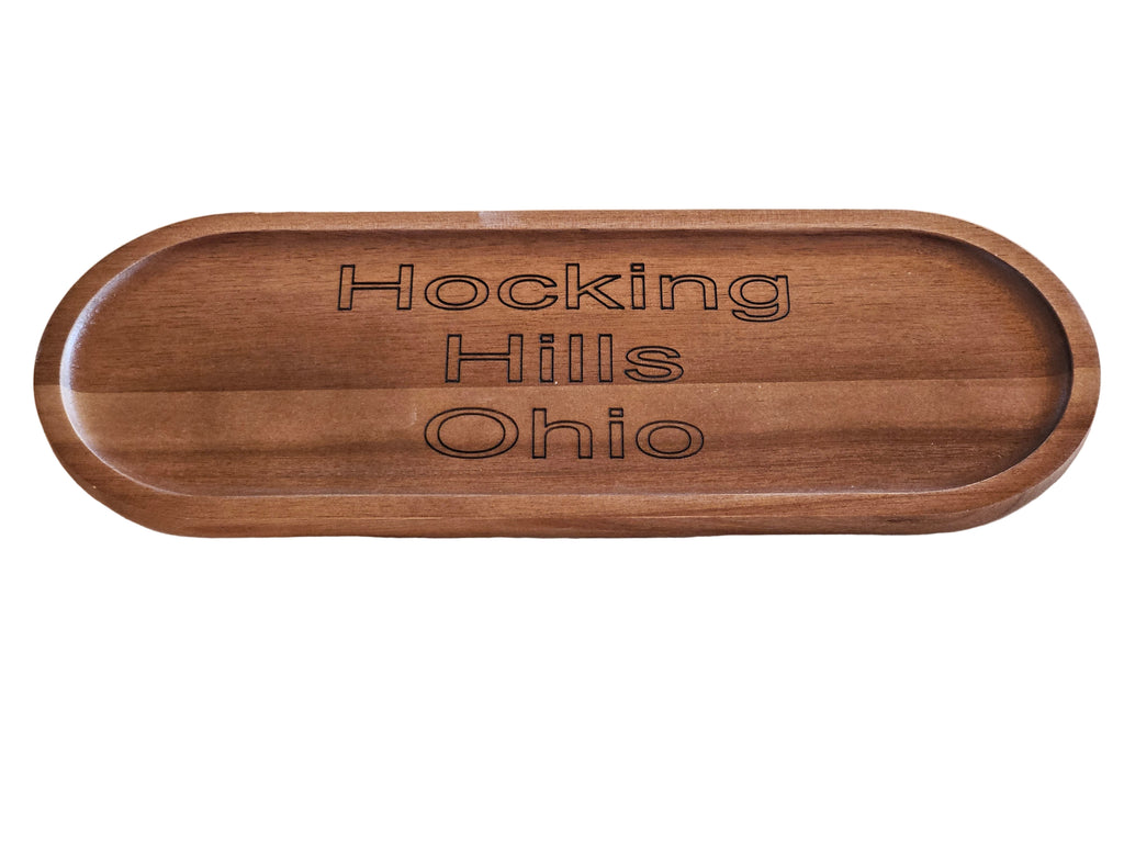 Wooden tray with 'Hocking Hills Ohio' engraving on a white surface