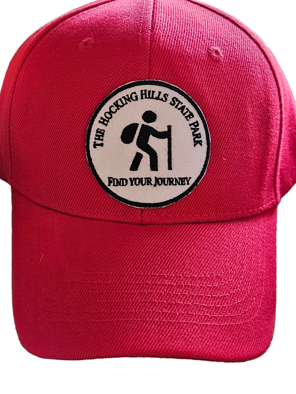 Red cap with a black and white logo on a blurred background