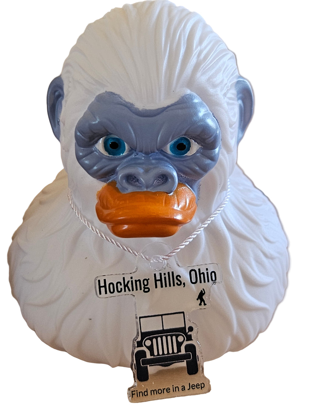 Decorative item shaped like a brain with a face, featuring text and graphics on a beige background.