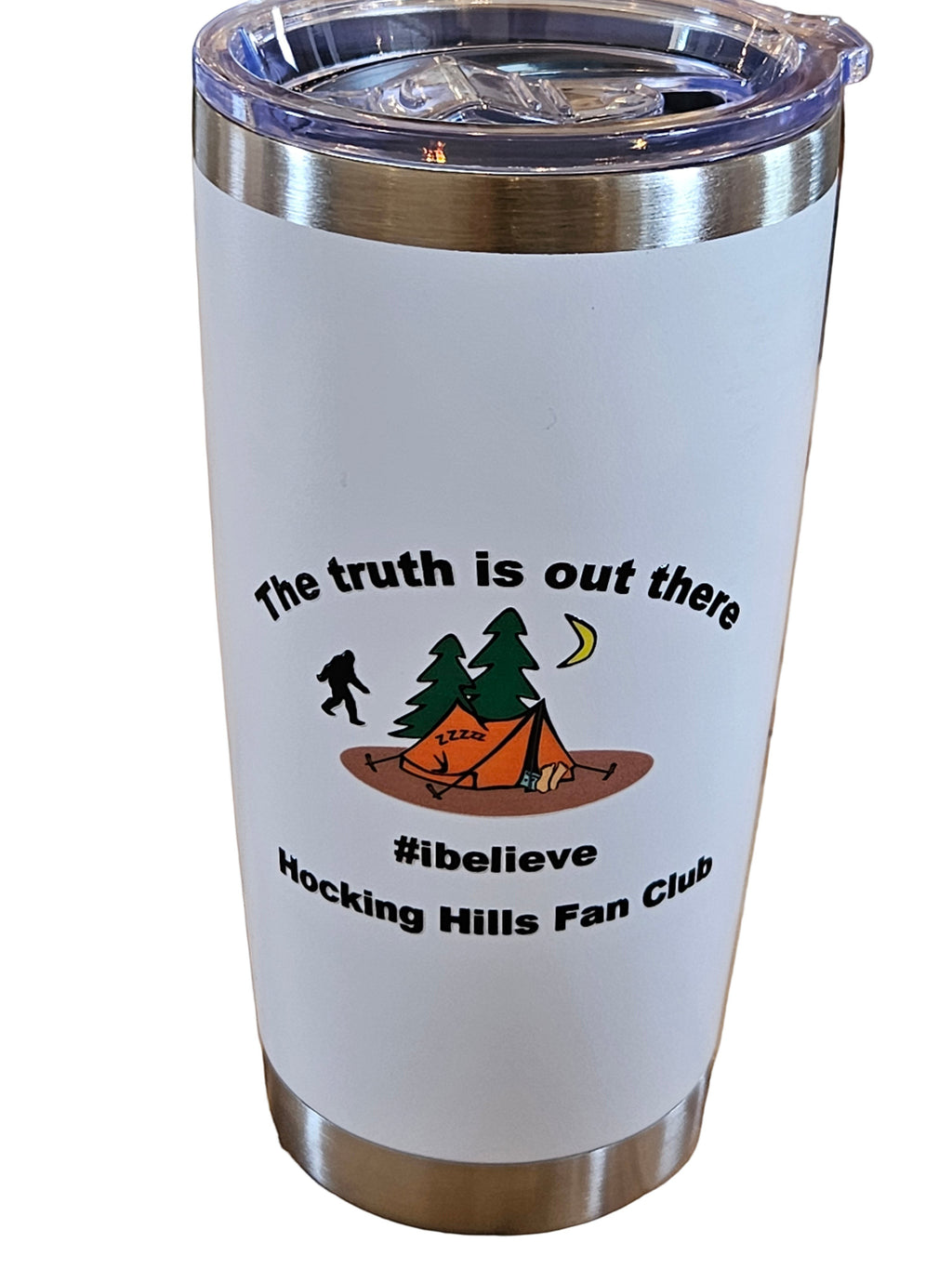 The Hocking Hills Store 20 oz white tumbler with Bigfoot, tent, and trees graphic. Features text "The truth is out there #ibelieve Hocking Hills Fan Club".