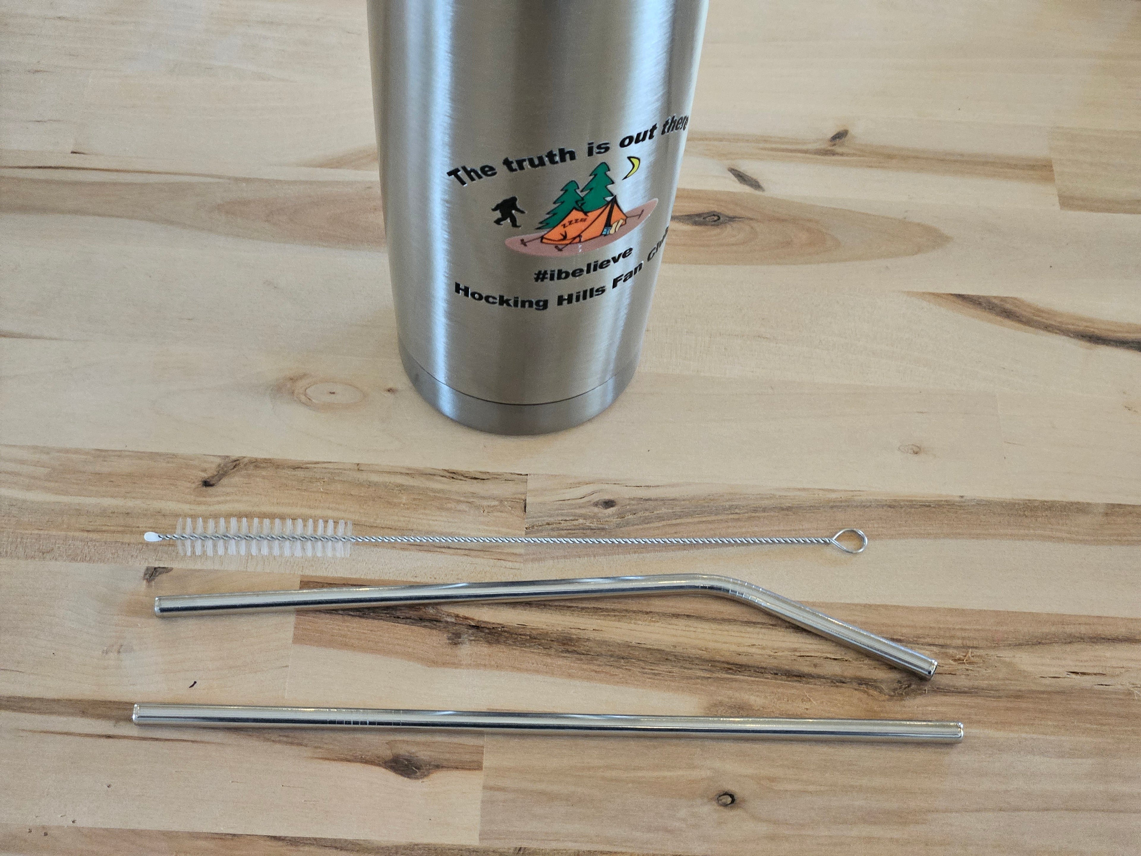 The Hocking Hills Store 20 oz stainless steel tumbler with Hocking Hills Fan Club graphic and included straws and cleaning brush.
