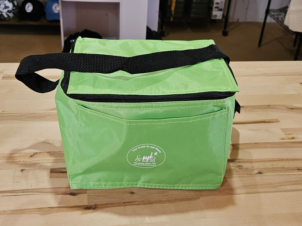 The Hocking Hills Store 6 Pack Soft Cooler in lime green with black trim and handle. Features a zippered top and front pocket.