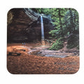 The Hocking Hills Store mouse pad featuring Ash Cave waterfall with two people and a bench.