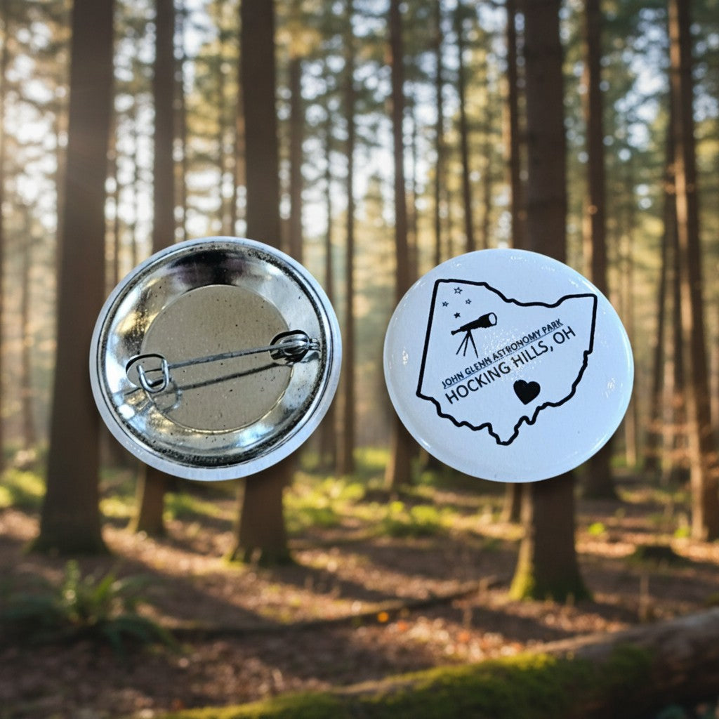 The Hocking Hills Store John Glenn Astronomy Park button featuring an Ohio outline with a telescope and stars.