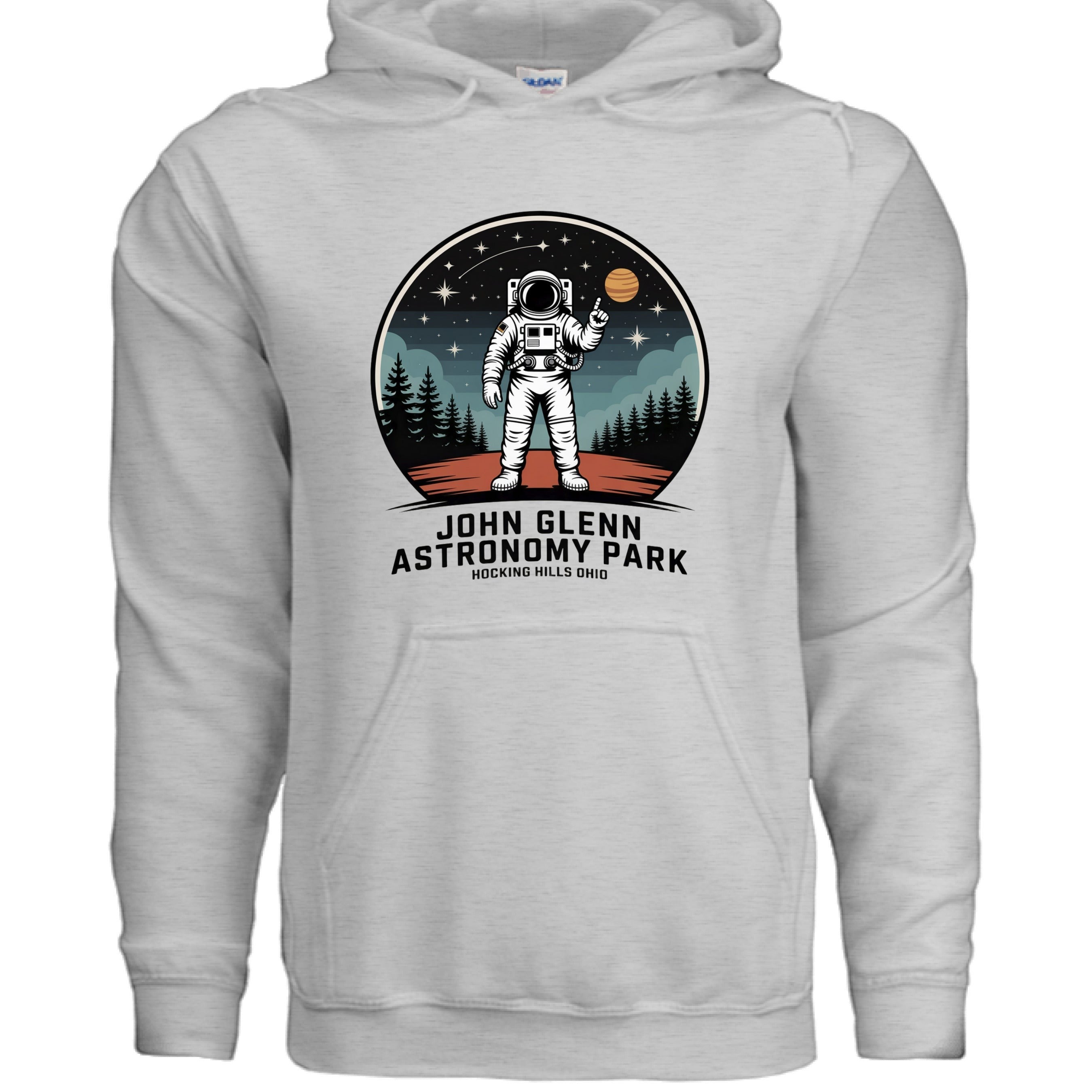The Hocking Hills Store John Glenn Astronomy Park hoodie features an astronaut graphic with stars and trees. White cotton blend pullover.
