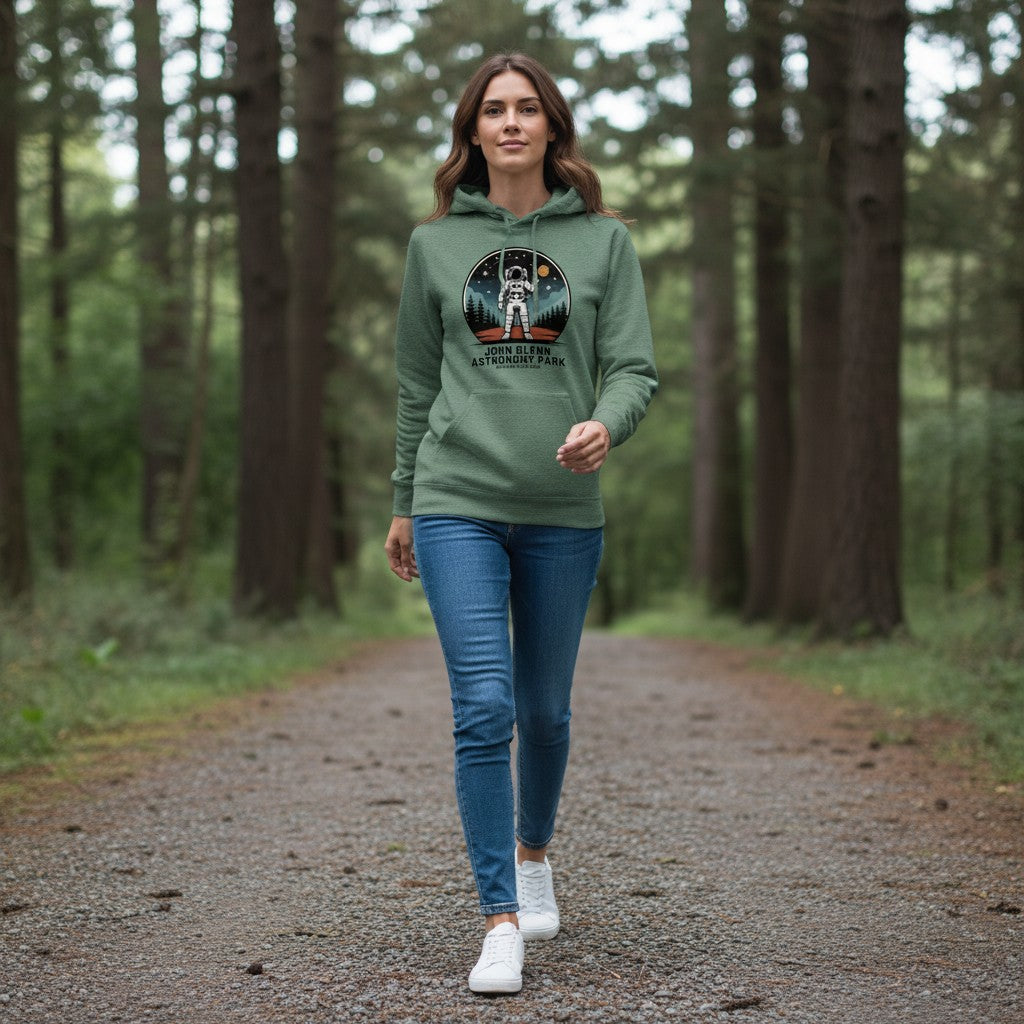 The Hocking Hills Store John Glenn Astronomy Park heather green cotton-blend hoodie with astronaut graphic.