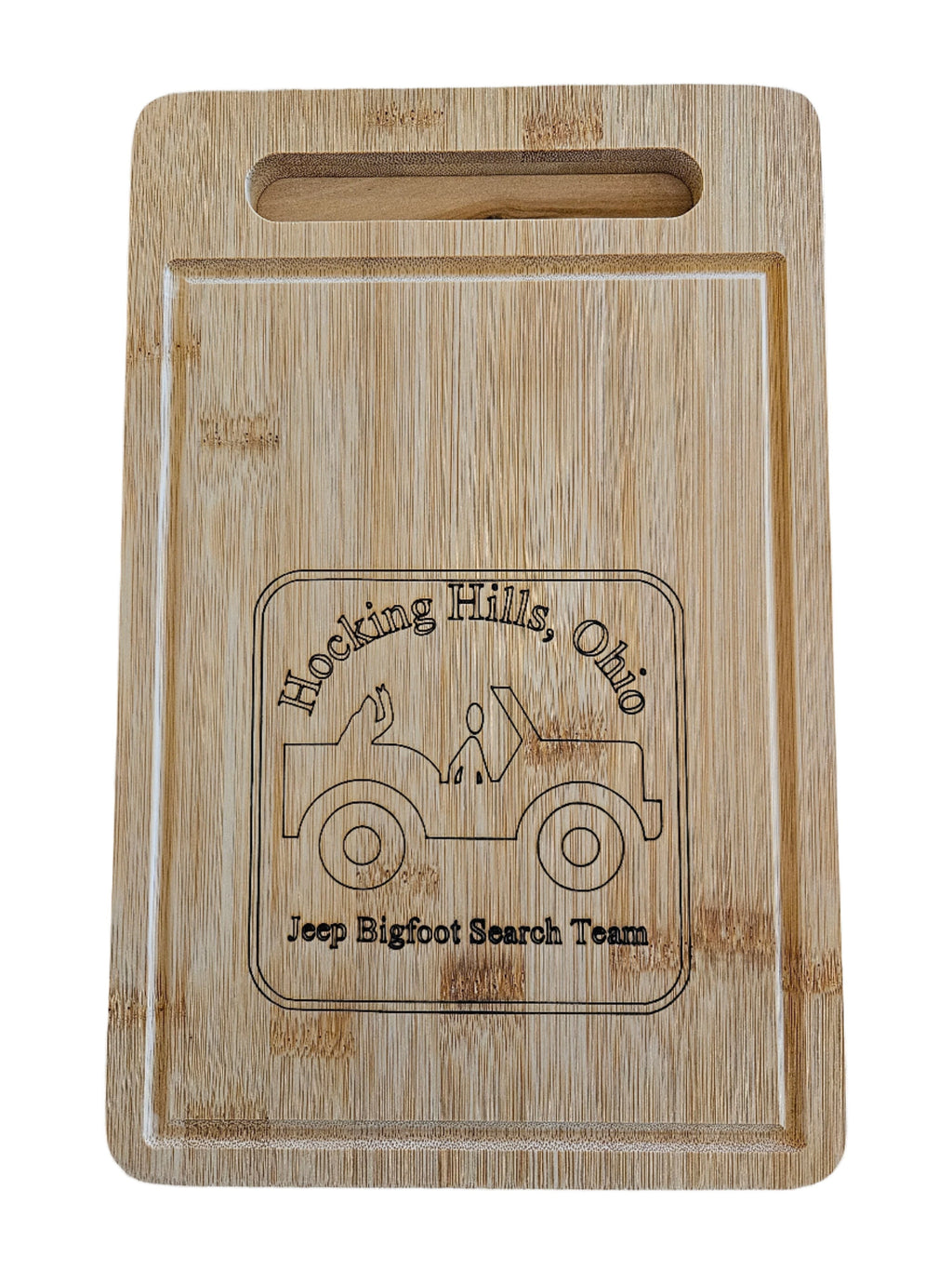 The Hocking Hills Store rectangle bamboo cutting board with a carved graphic of a jeep and the text "Hocking Hills, Ohio Jeep Bigfoot Search Team".