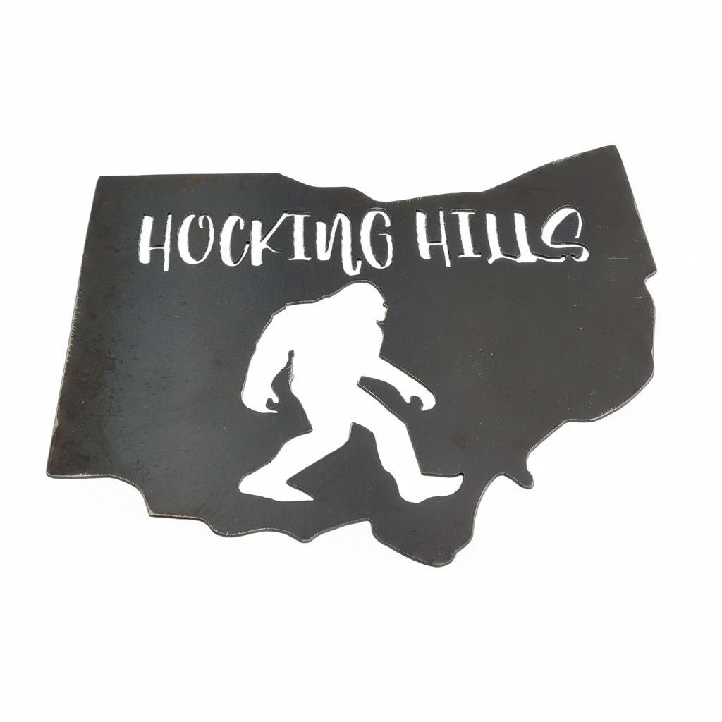 The Hocking Hills Store Bigfoot metal art sign shaped like Ohio with 'HOCKING HILLS' text.