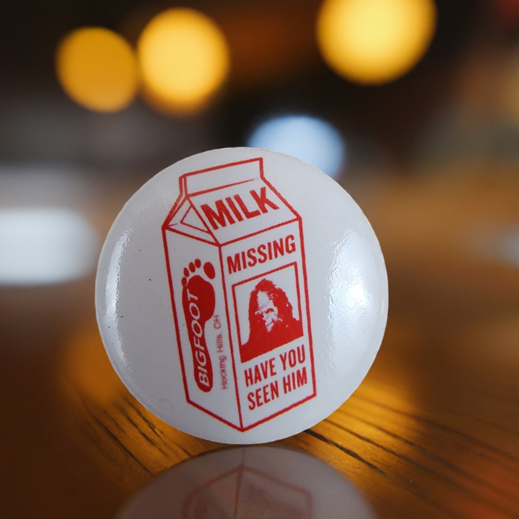 The Hocking Hills Store Big Foot milk carton button with red text and image of Bigfoot.