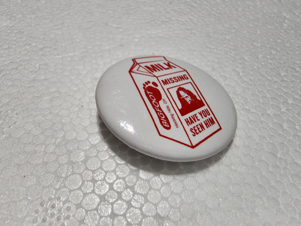 The Hocking Hills Store Big Foot milk carton button with red text and image of Bigfoot.