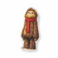 The Hocking Hills Store Small Bobby The Bigfoot plush toy wearing a red scarf. Soft, brown, furry character for imaginative play.