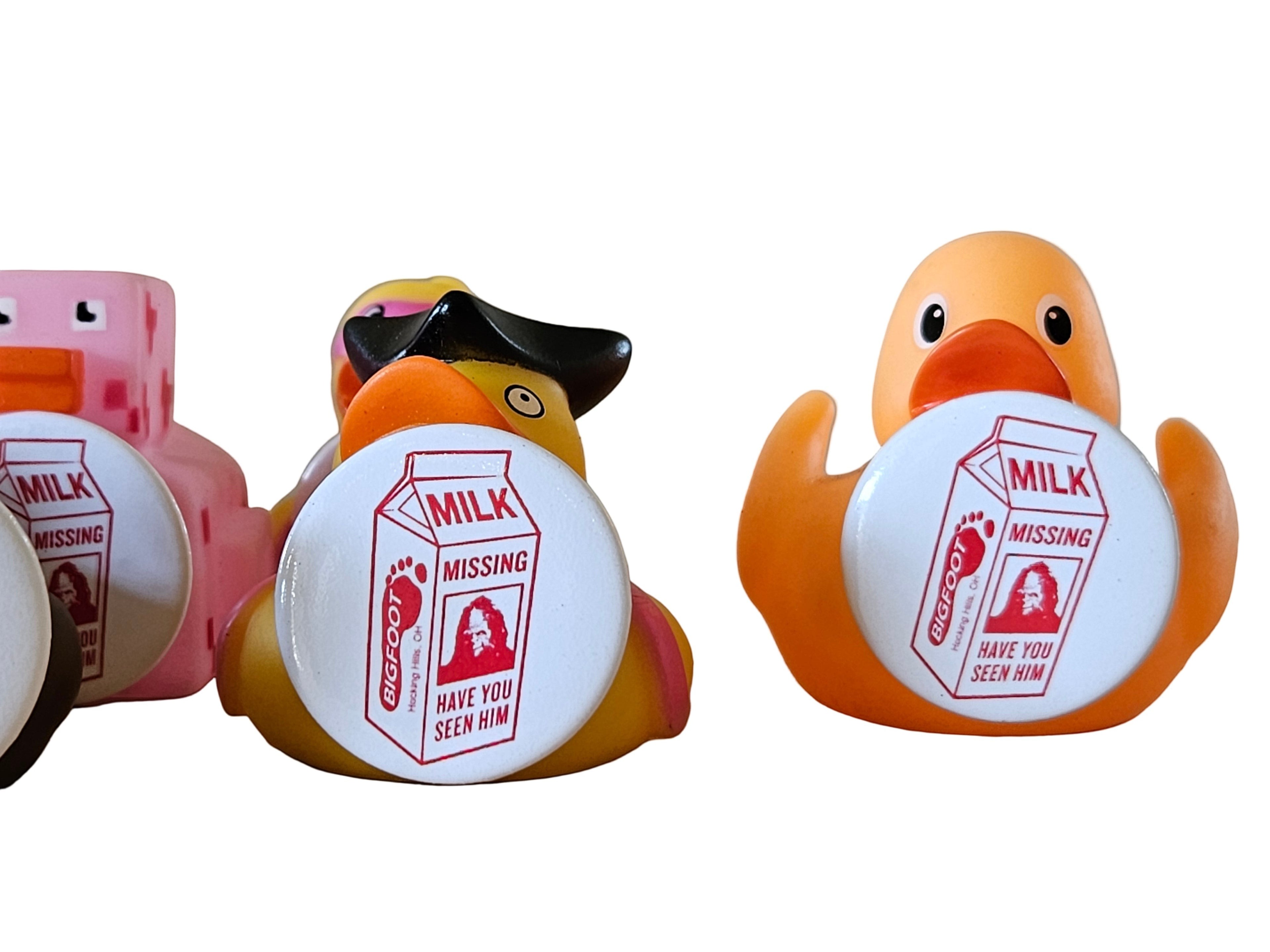 The Hocking Hills Store Bigfoot milk carton missing person rubber ducks. Orange and pink ducks with Bigfoot milk carton design.