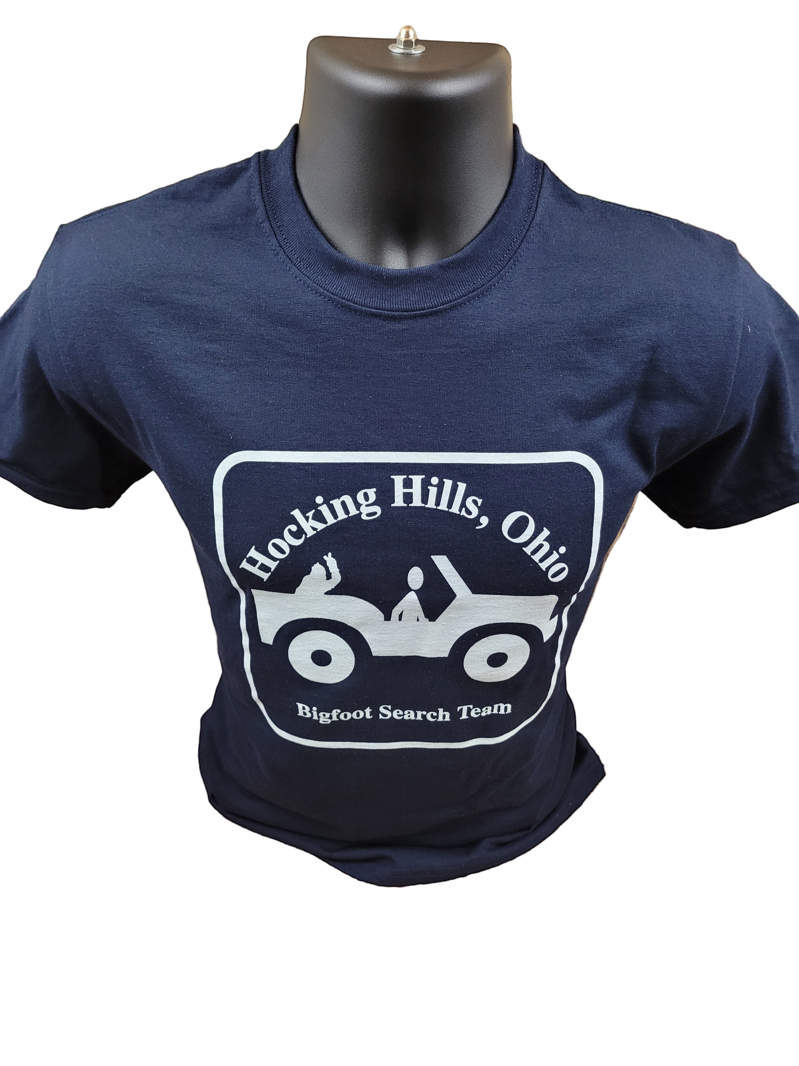 The Hocking Hills Store navy blue Bigfoot Search Team t-shirt with white graphic of a jeep and text.