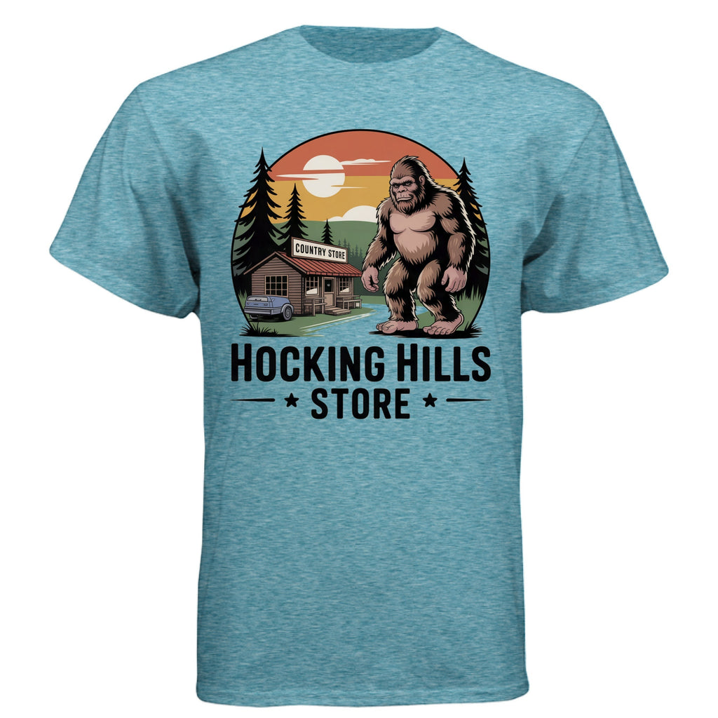 The Hocking Hills Store Bigfoot T-Shirt in heathered blue tri-blend fabric, featuring a graphic of Bigfoot standing outside a country store.