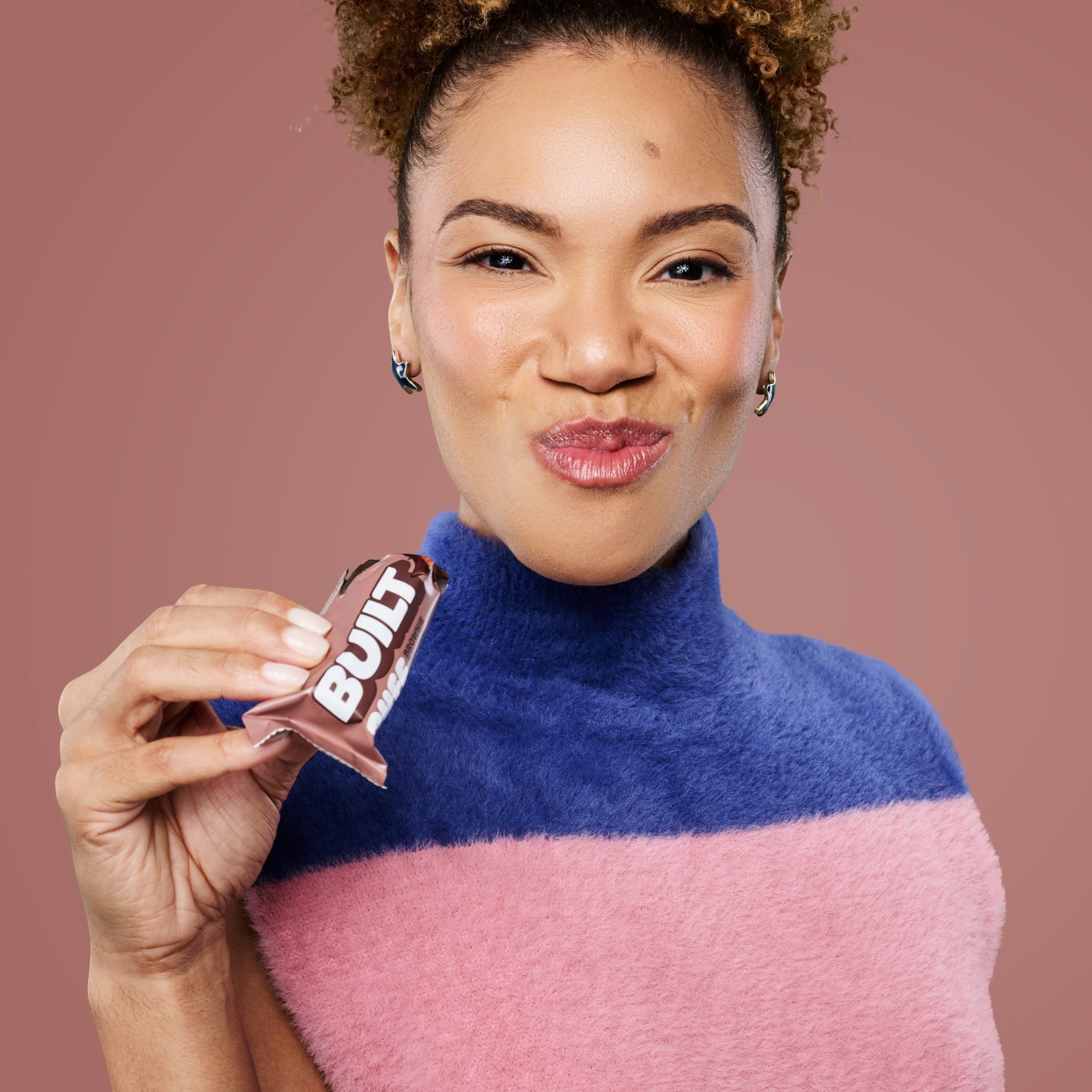 The Hocking Hills Store Brownie Batter Puff protein bar, chocolate-covered with a fluffy marshmallow texture.