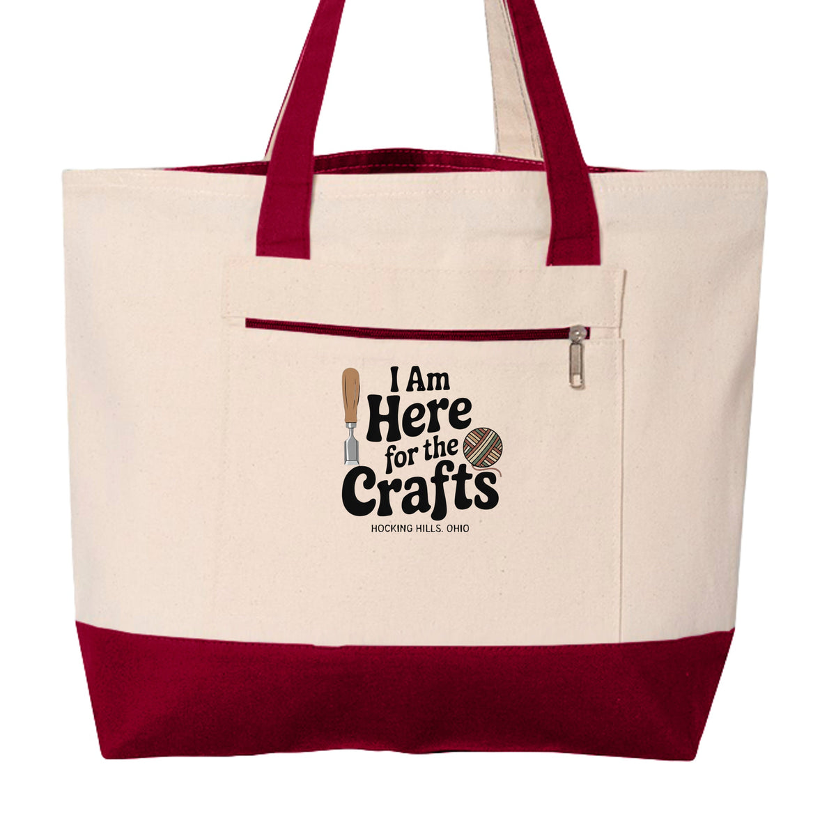 The Hocking Hills Store heavy cotton canvas tote with red trim, front zipper pocket, and Here For Crafts graphic.