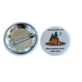The Hocking Hills Store "What Happens Here Stays Here" camping button featuring a tent, trees, moon, and text.