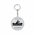 The Hocking Hills Store keychain with a circular design featuring a black silhouette of a person canoeing, the text "Canoeing = Love", and "Hocking Hills, OH".