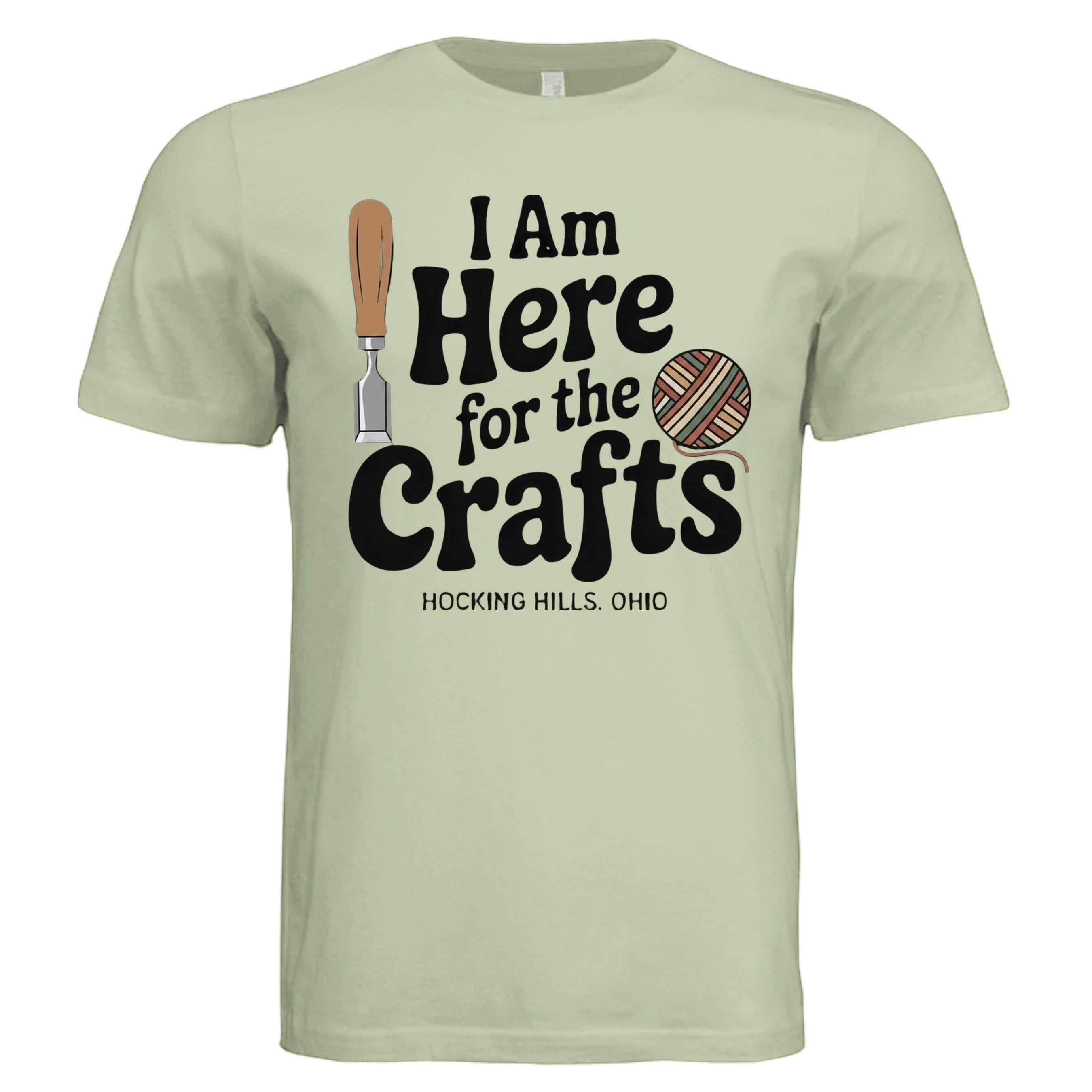 The Hocking Hills Store light green triblend t-shirt with "I Am Here for the Crafts" graphic, featuring a chisel and yarn ball.
