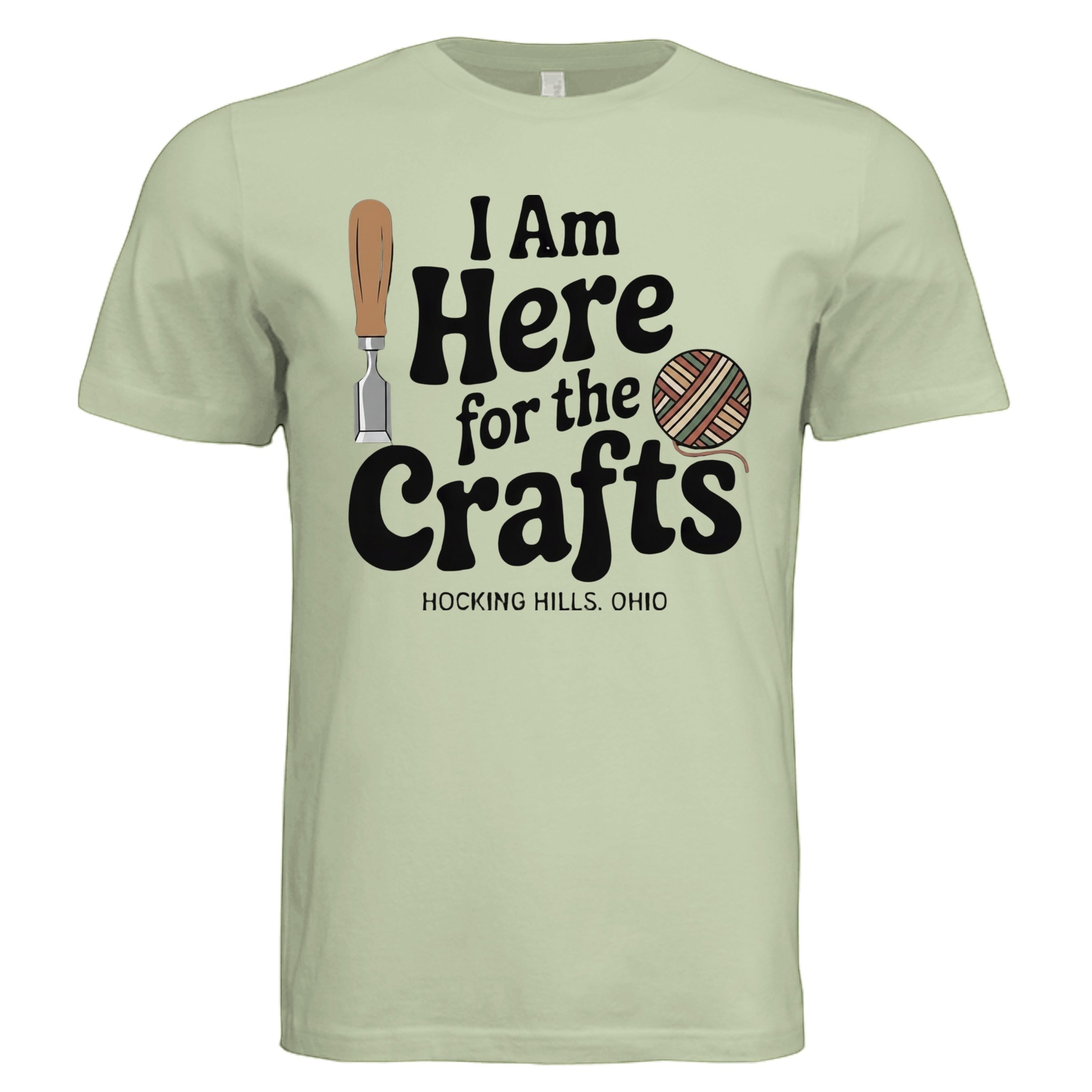The Hocking Hills Store light green triblend t-shirt with "I Am Here for the Crafts" graphic, featuring a chisel and yarn ball.