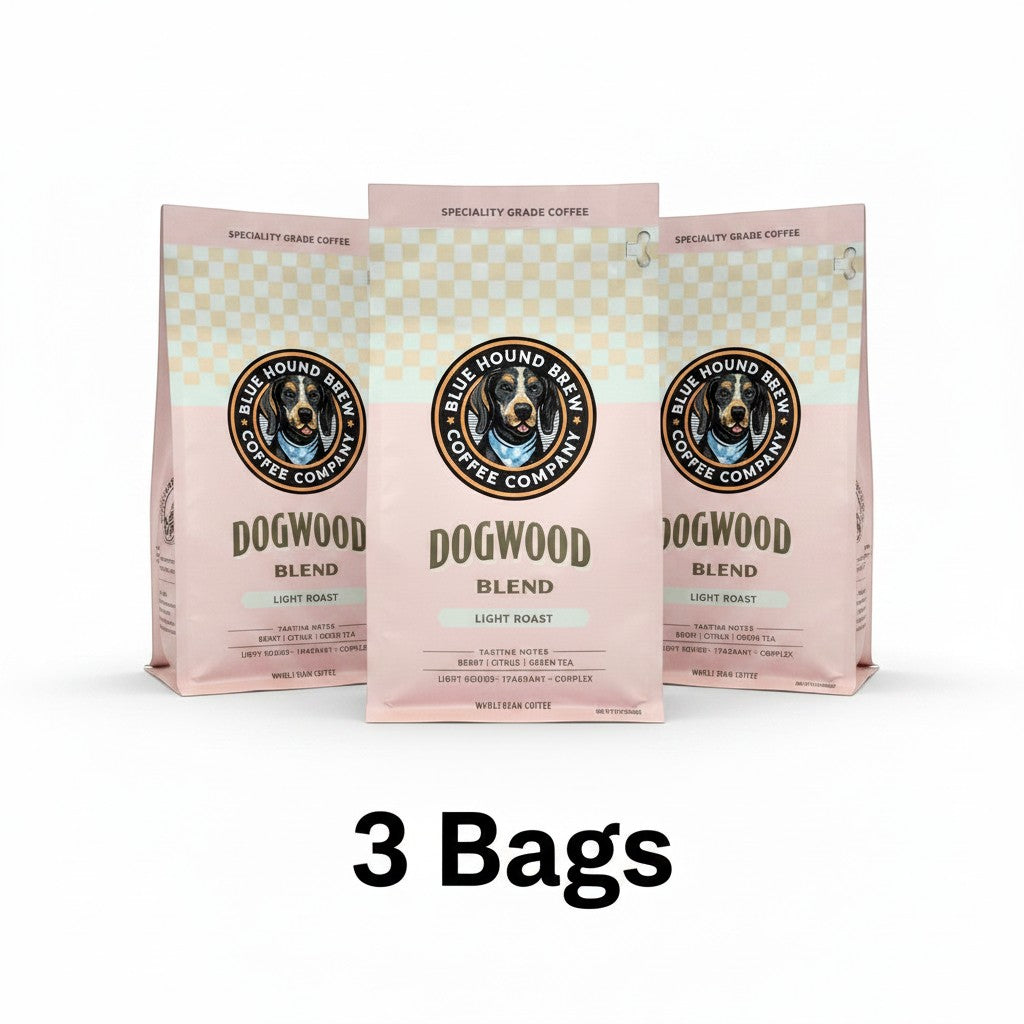 The Hocking Hills Store Dogwood Blend light roast coffee bags. Features a dog illustration and tasting notes of berry, citrus, and green tea.