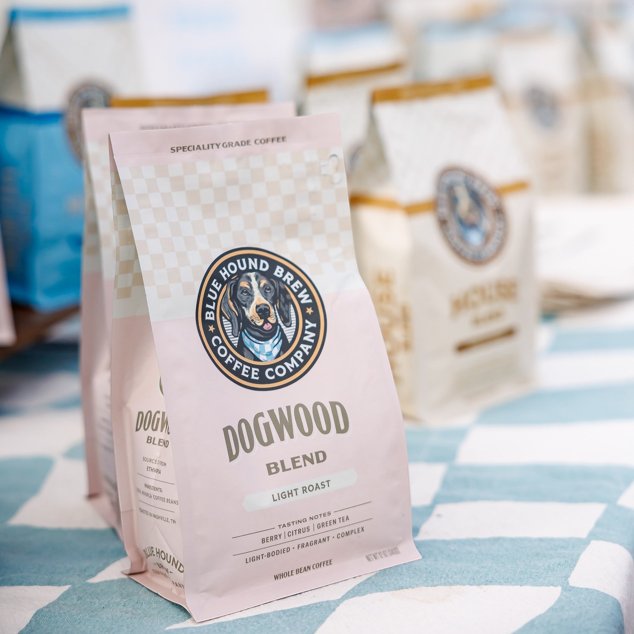 The Hocking Hills Store Dogwood Blend light roast whole bean coffee bag with tasting notes of berry, citrus, and green tea.