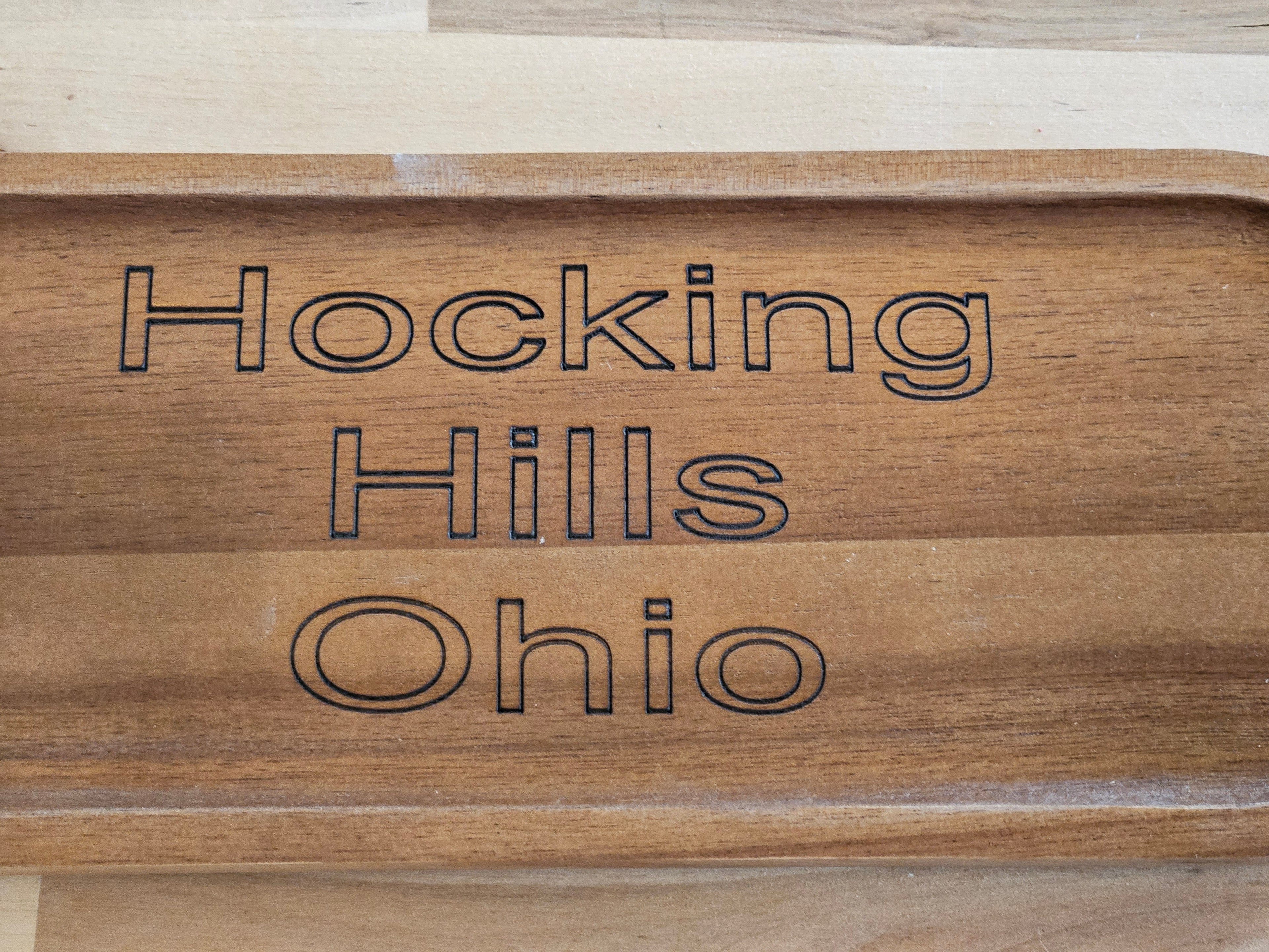 The Hocking Hills Store engraved wooden serving tray with "Hocking Hills Ohio" text. Small rustic wood tray for snacks.
