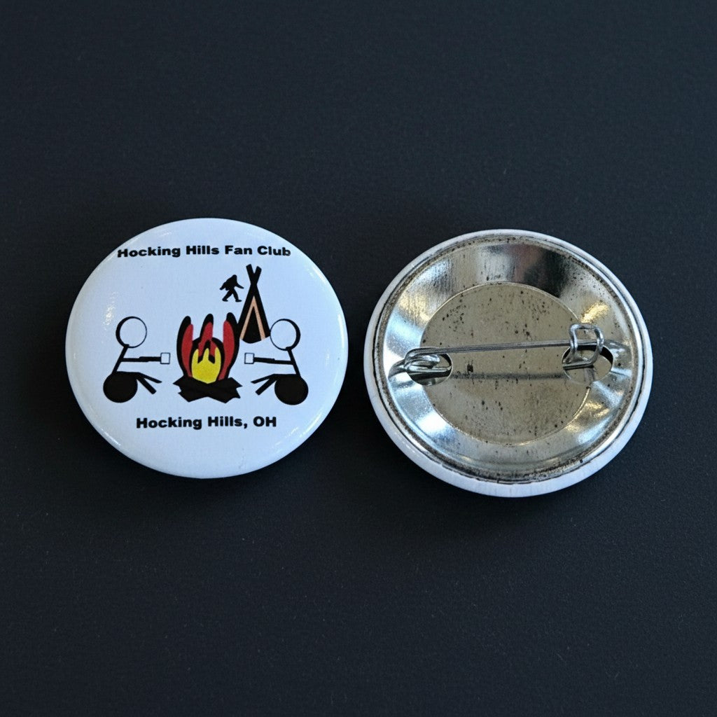 The Hocking Hills Store fan club button with stick figures around a campfire and text 'Hocking Hills, OH'.