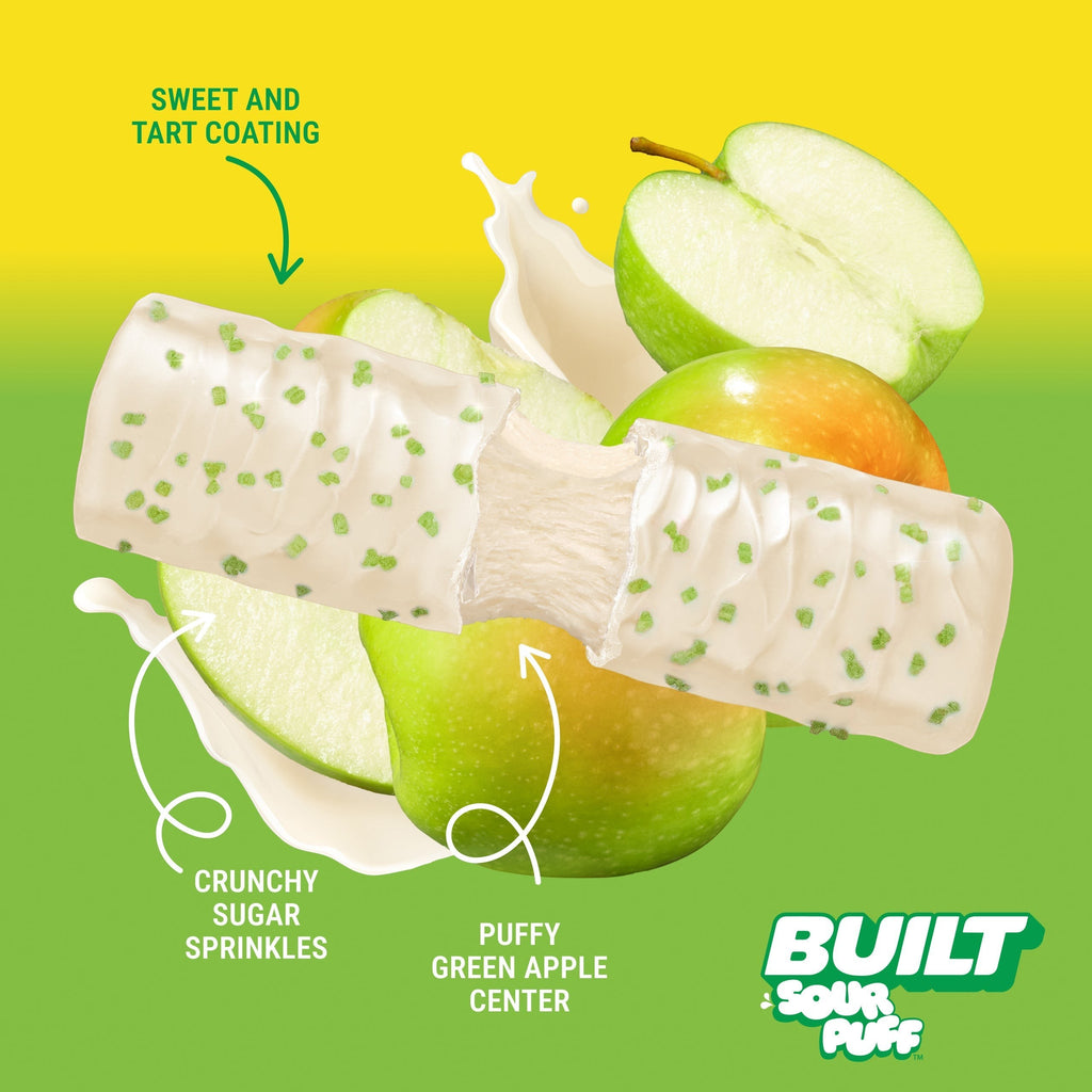 The Hocking Hills Store Green Apple Crush Sour Puff bar with a white sweet and tart coating, crunchy sugar sprinkles, and a puffy green apple center.