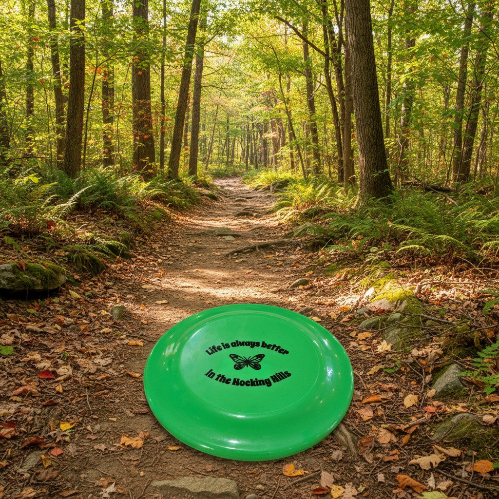 The Hocking Hills Store green frisbee with butterfly graphic and text "Life is always better in the Hocking Hills".