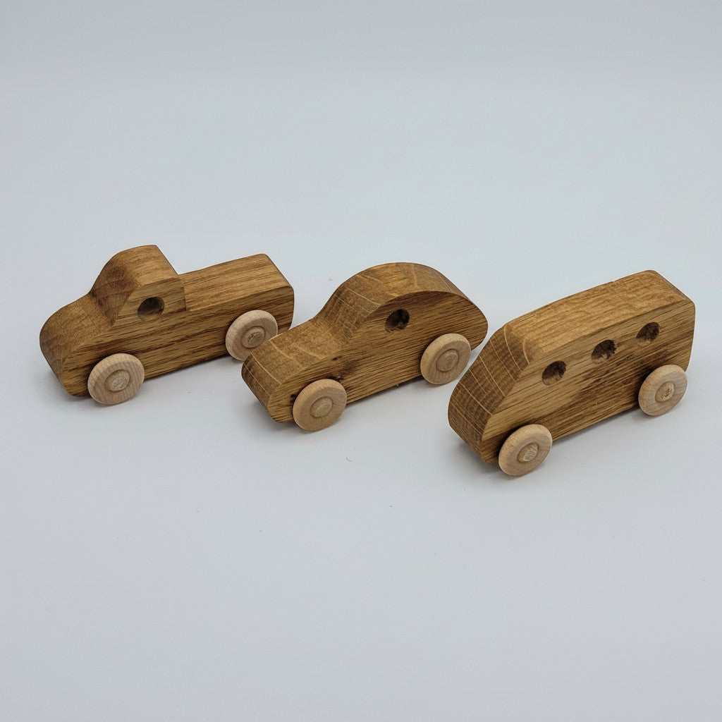 The Hocking Hills Store handmade wooden cars, including a pickup truck and two car shapes, on a white background.