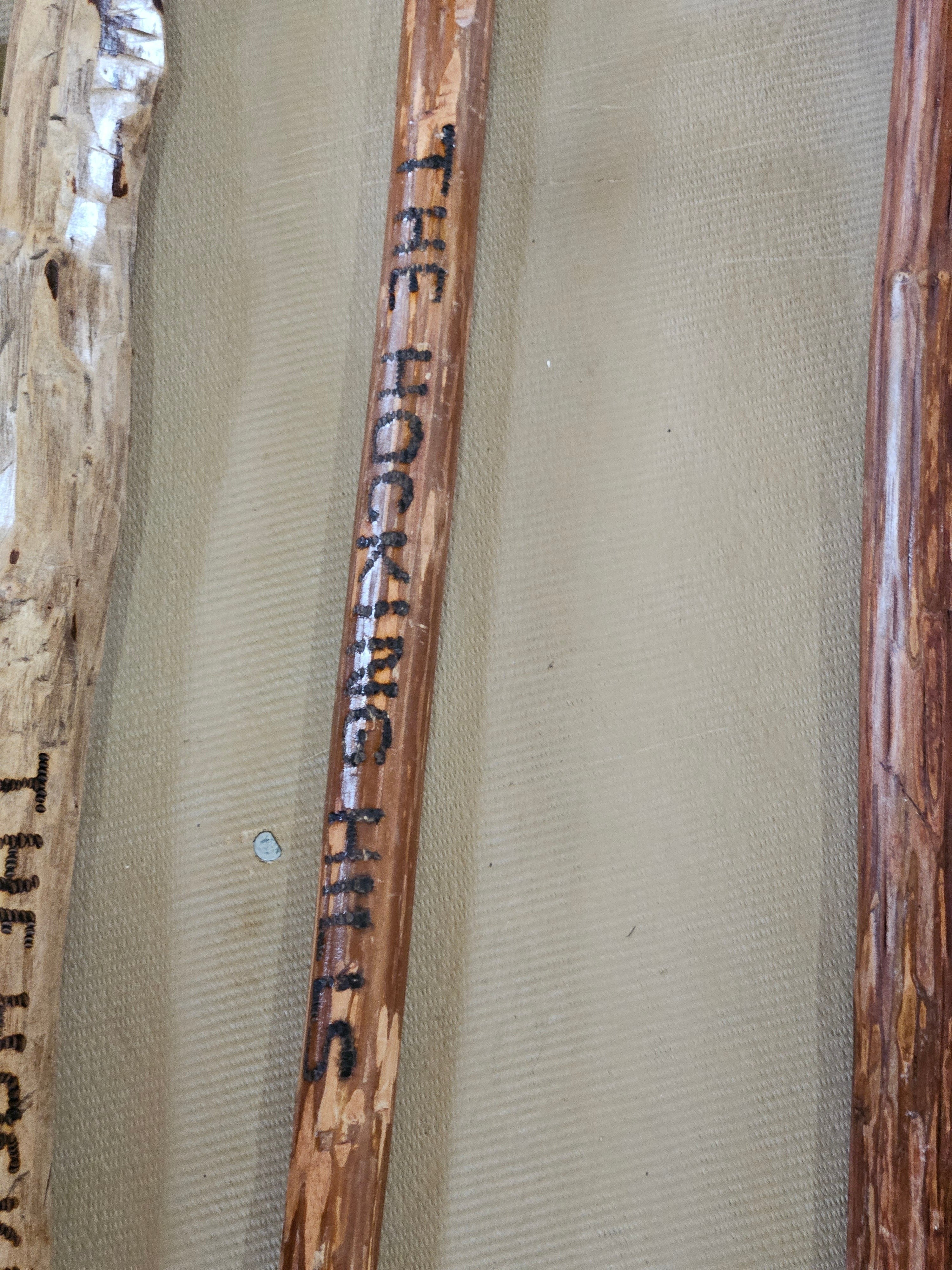 The Hocking Hills Store handmade wooden walking stick, natural wood grain, unique artisan craftsmanship for hiking.