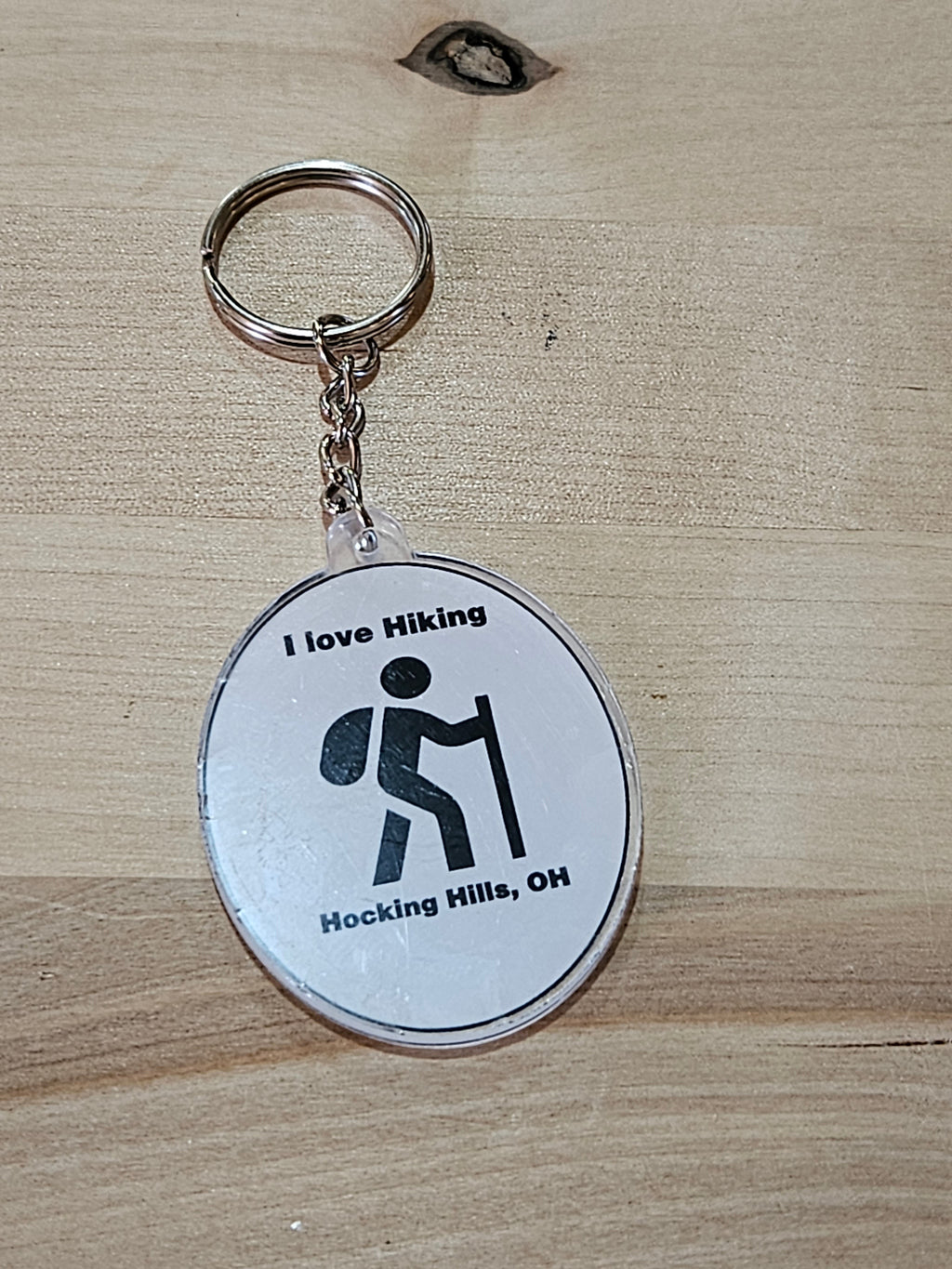The Hocking Hills Store keychain with a hiker icon and text 'I love Hiking Hocking Hills, OH'.