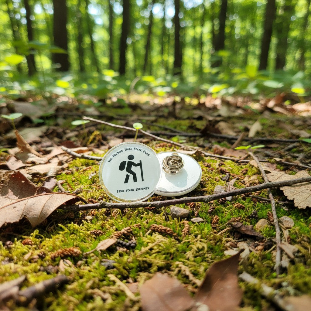The Hocking Hills Store Hocking Hills State Park collector pin with hiker graphic and "find your journey" text.