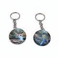 The Hocking Hills Store keychain features a scenic waterfall image from Hocking Hills, Ohio, with a silver metal ring and chain.