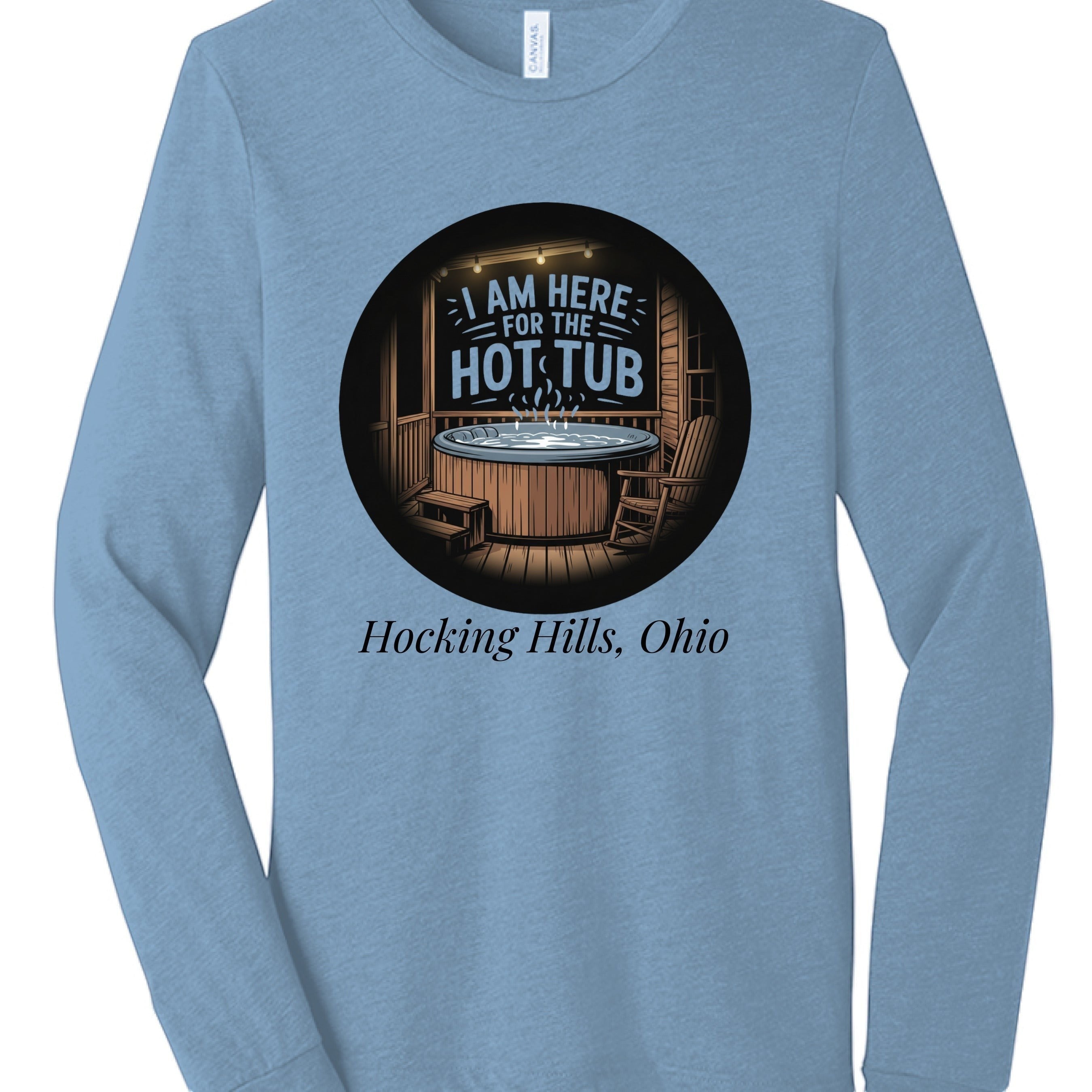 The Hocking Hills Store light blue tri-blend long sleeve tee with a graphic that says "I Am Here For The Hot Tub" above a hot tub.