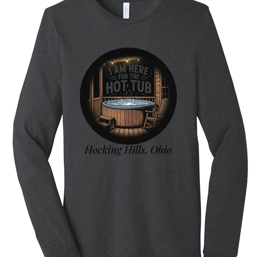 The Hocking Hills Store charcoal tri-blend long sleeve tee with "I Am Here For The Hot Tub" graphic and Hocking Hills, Ohio text.