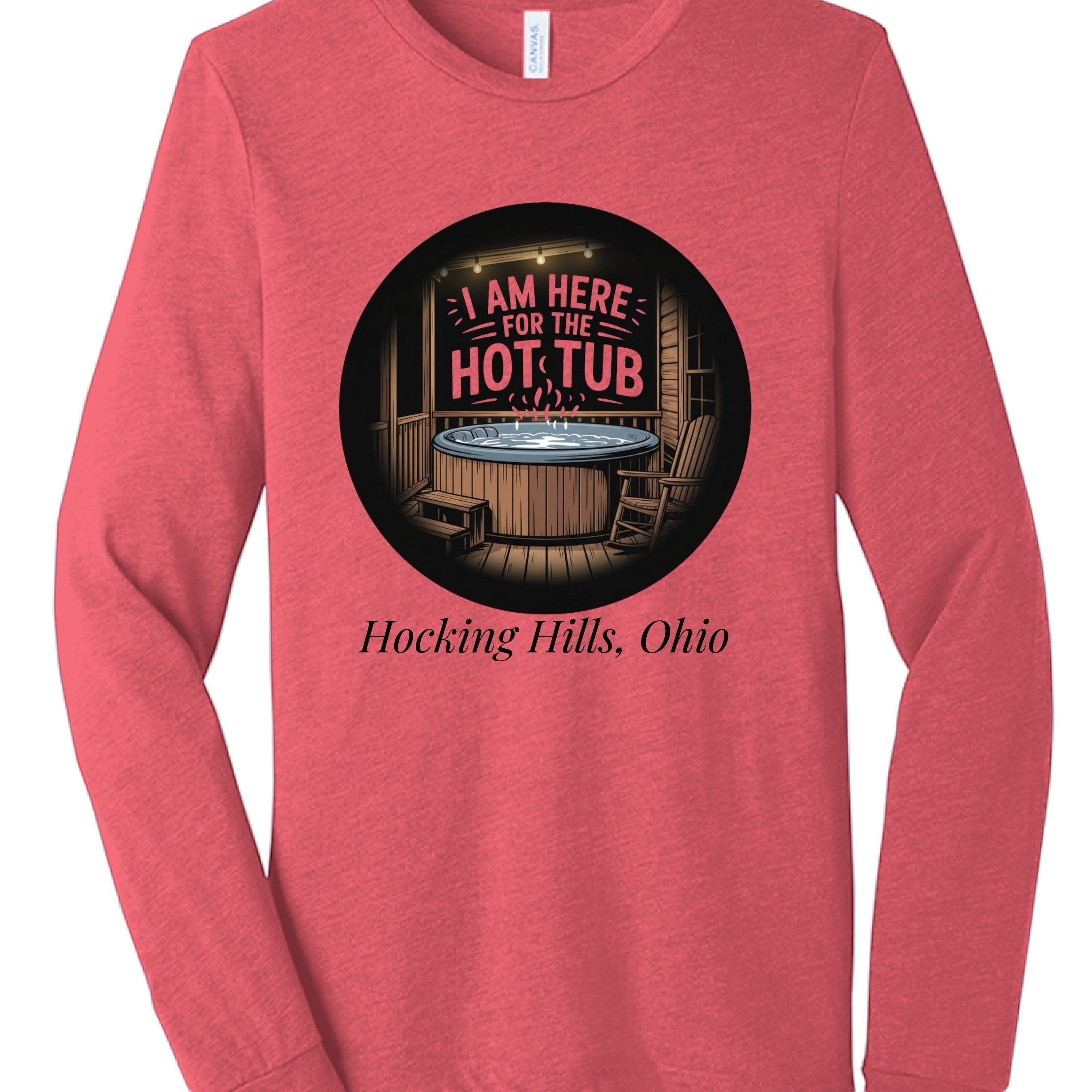 The Hocking Hills Store I'm Here for the Hot Tub tri-blend long sleeve tee in heathered coral. Features a graphic of a hot tub on a deck with string lights.