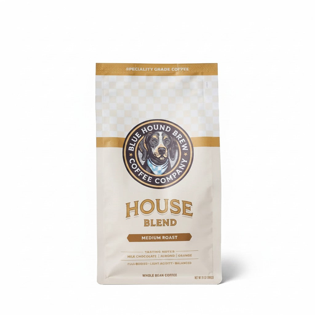 The Hocking Hills Store Blue Hound Brew House Blend medium roast whole bean coffee bag with tasting notes of milk chocolate, almond, and orange.