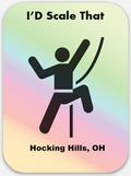 The Hocking Hills Store "I'd Scale That" bumper sticker featuring a black silhouette of a climber on a pastel gradient background.