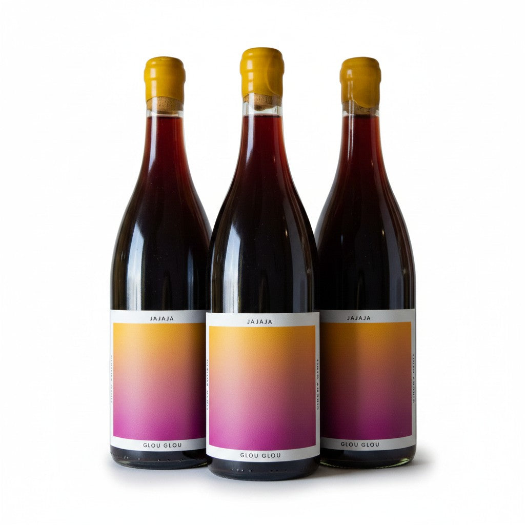 The Hocking Hills Store Jajaja Glou Glou red wine bottle with a yellow cap and a gradient label.