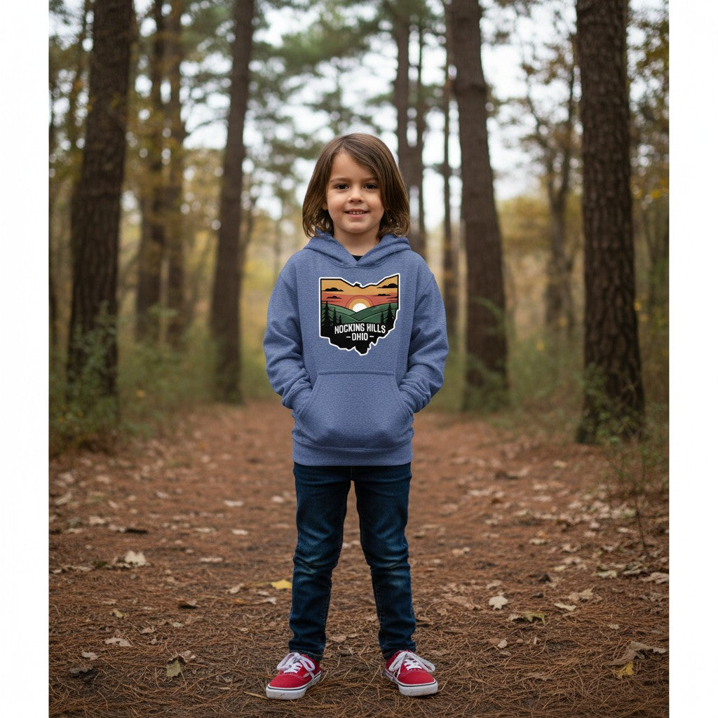 The Hocking Hills Store kids' heathered blue pullover hoodie with a graphic of Ohio featuring a sunset over rolling hills and trees.