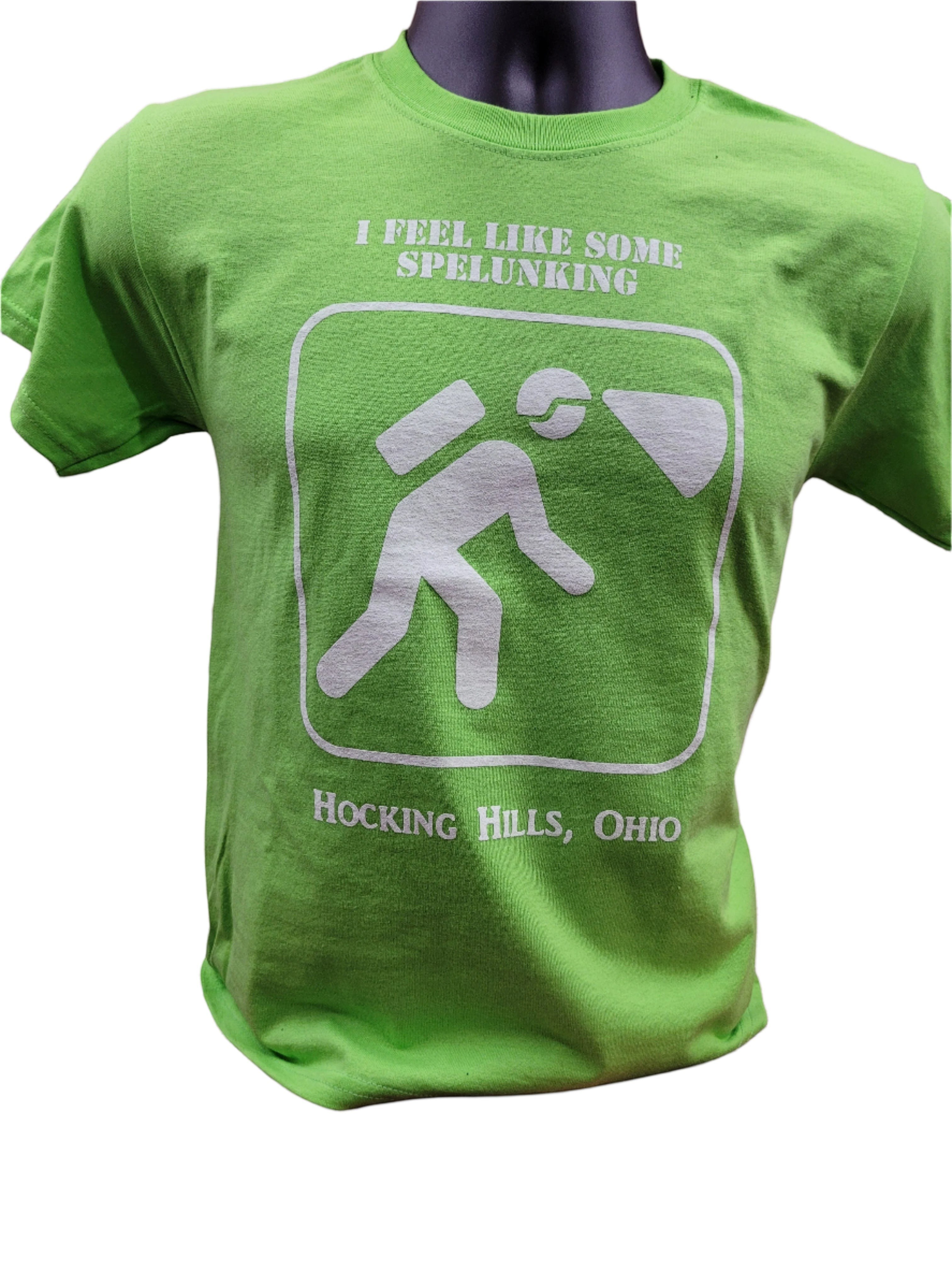 The Hocking Hills Store lime green graphic tee with a white spelunker icon and text "I FEEL LIKE SOME SPELUNKING HOCKING HILLS, OHIO".
