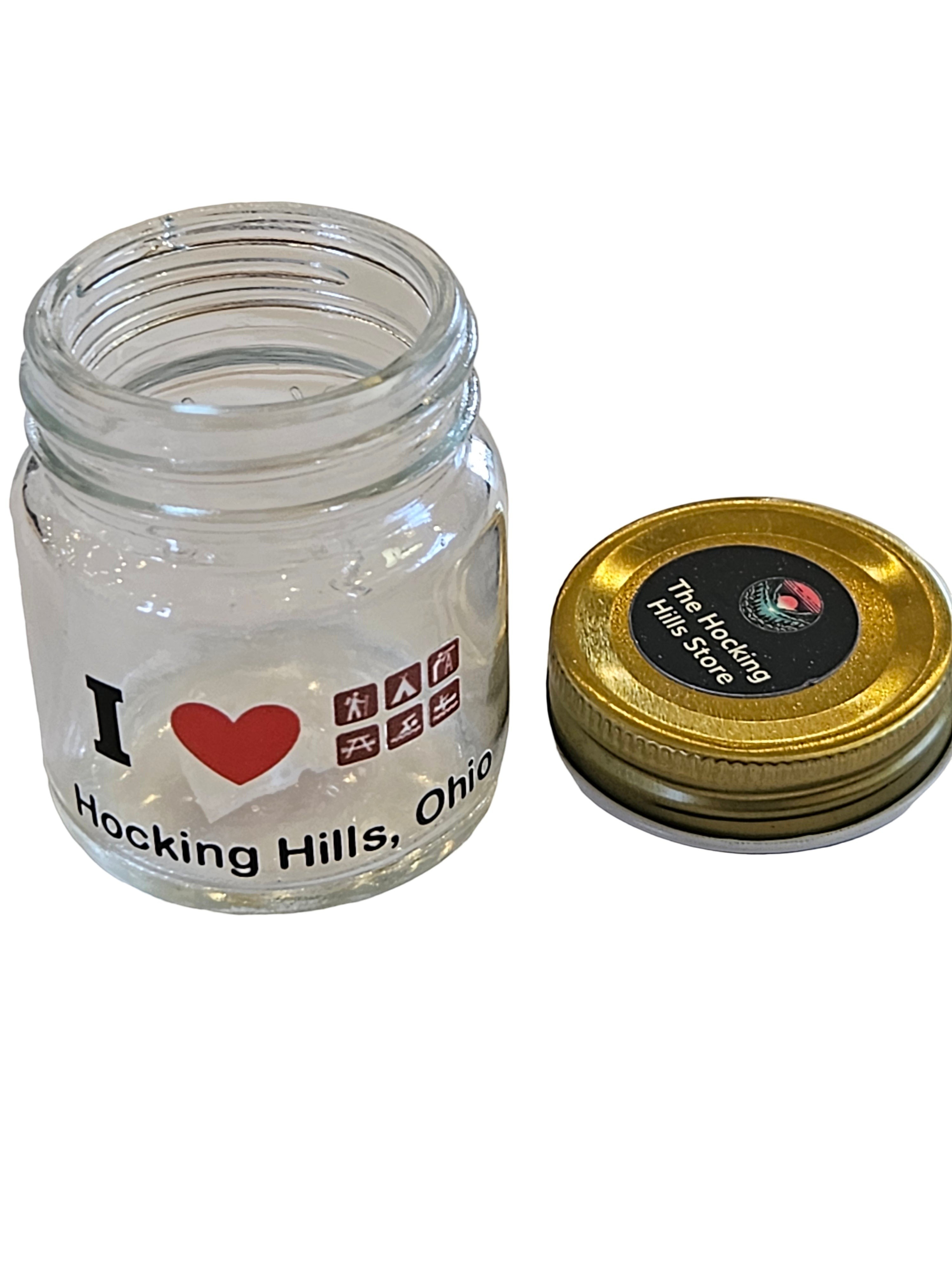 The Hocking Hills Store mason jar shot glass with I love Hocking Hills, Ohio graphic and gold lid.